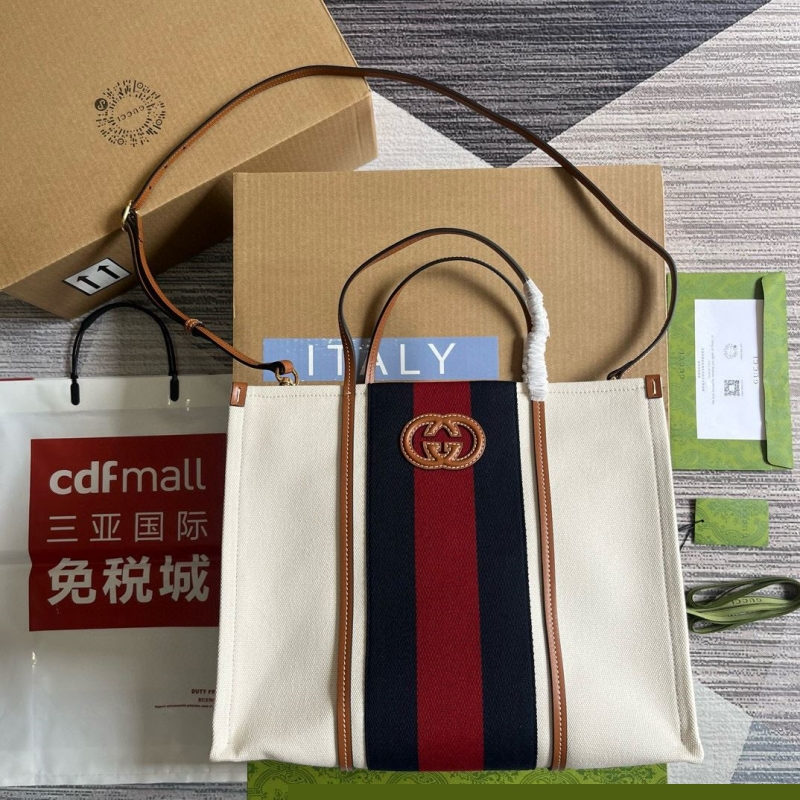 G*u*i shopping bags